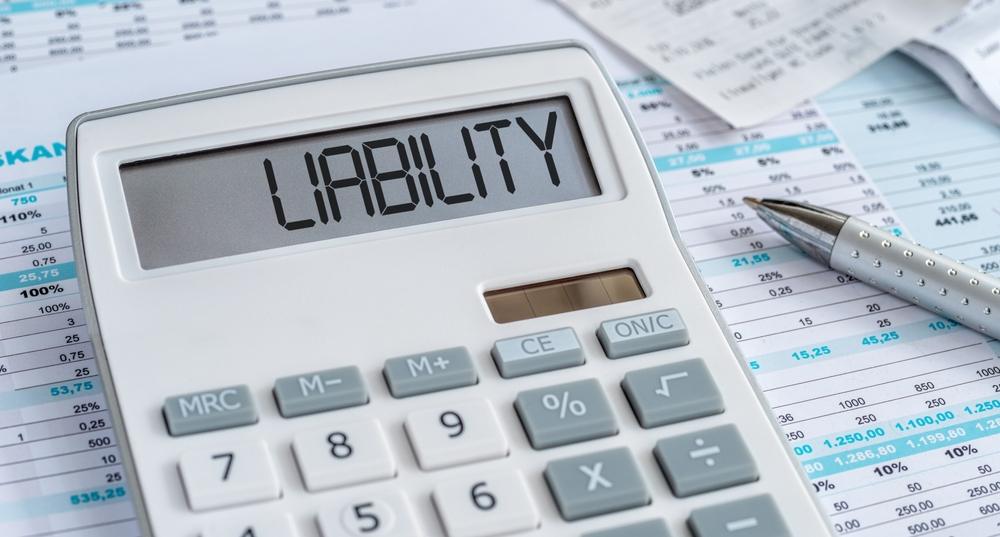 A calculator with the word Liability on the display