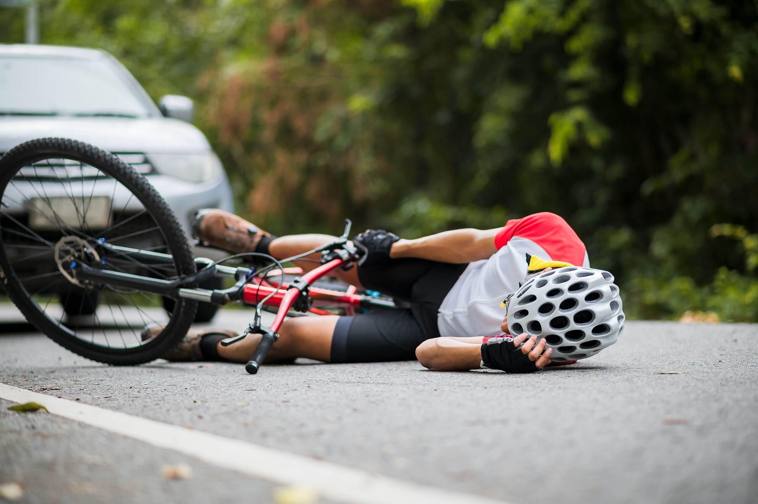 Cyclist injured in a dooring accident on a downtown Salt Lake City street.