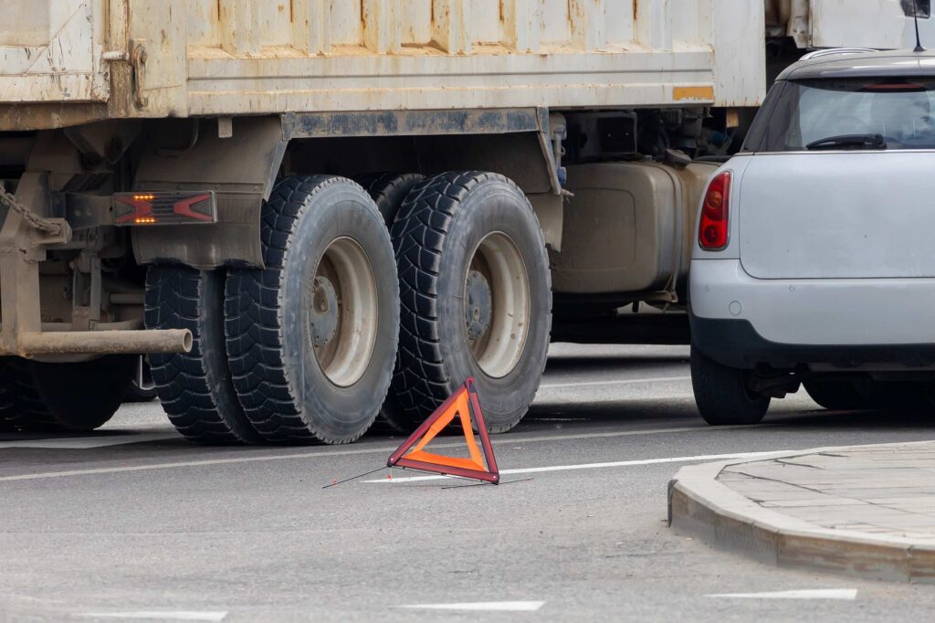 Truck accident scene on Fort Union Boulevard involving a cargo shift.