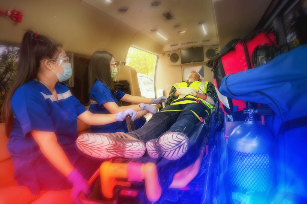 Medical experts providing emergency care to a TBI victim after a car accident in Ogden to document critical early evidence.