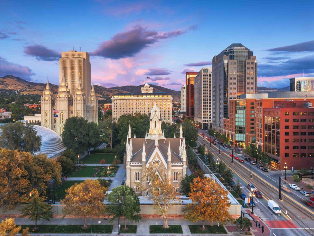 An aerial view of Temple Square and the downtown Salt Lake City skyline at dusk, representing the local service area for Salt Lake City DUI Accident Lawyers.