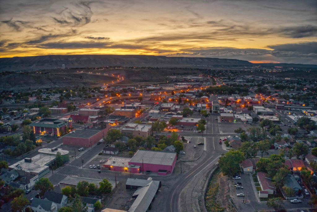 An aerial view of Rock Springs at sunset highlights the service area for Rock Springs Drunk Driving Accident Lawyers.
