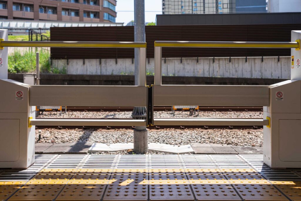 A automatic safety gate at a transit platform illustrates property safety cases handled by Spokane Premises Liability Lawyers.